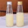 Lidded Glass Milk Bottle
