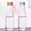 Lidded Glass Milk Bottle